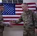 Lt. Gen. Patrick D. Frank, commanding general of U.S. Army Central, reenlists Spc. Nathan T. Rivera