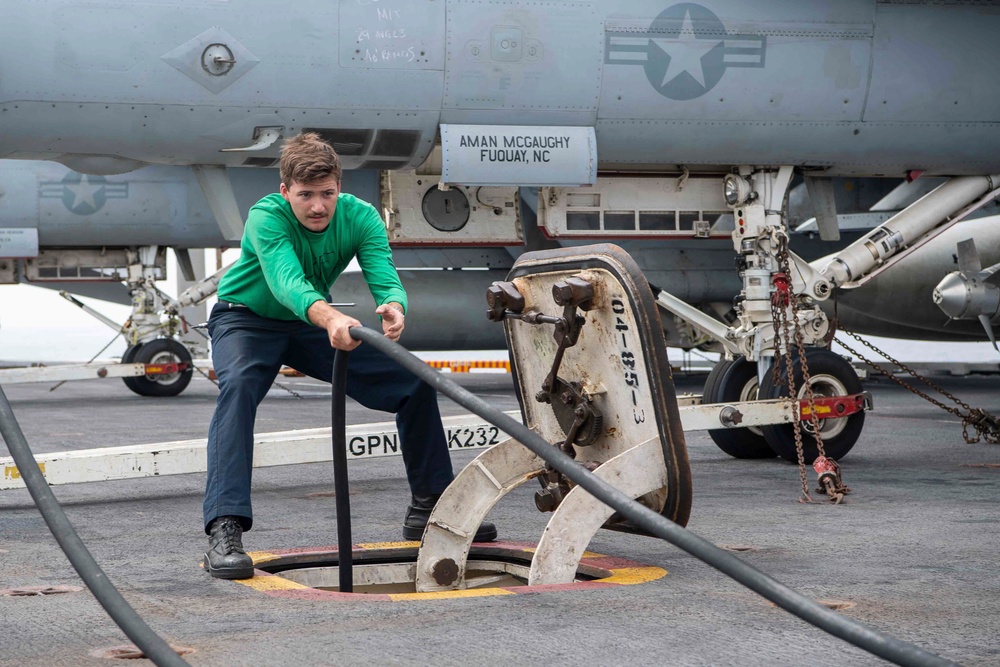 Sailor Stows Equipment