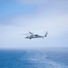 Helicopter launches from USS Nimitz flight deck