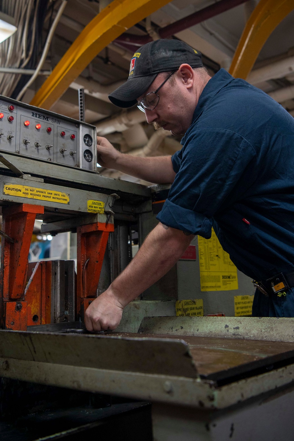 Sailor Repairs Pipe