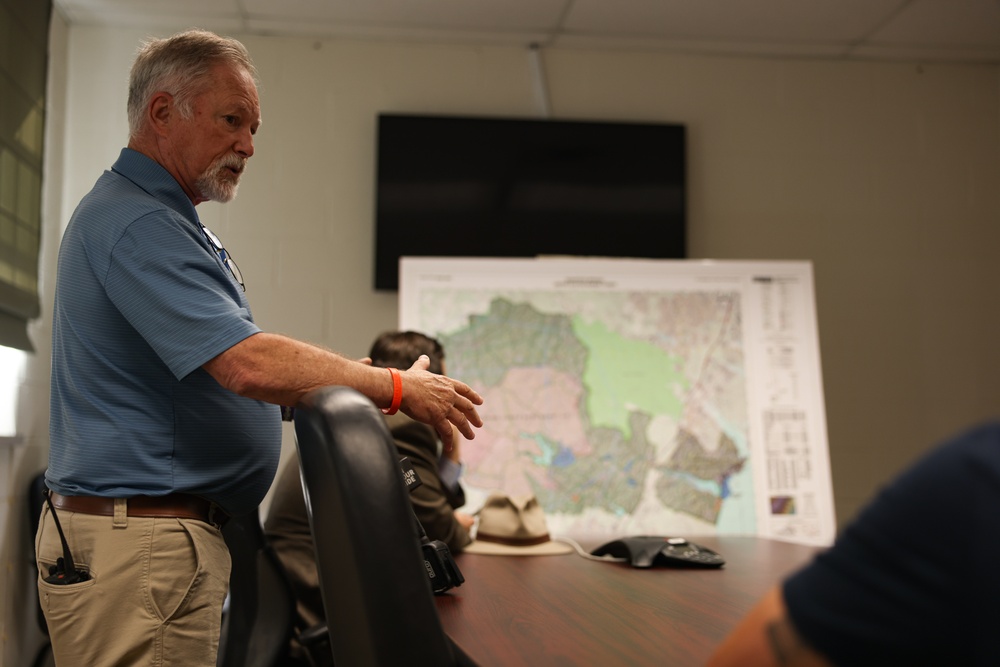 Col. Brooks welcomes visiting journalists for media roundtable discussion