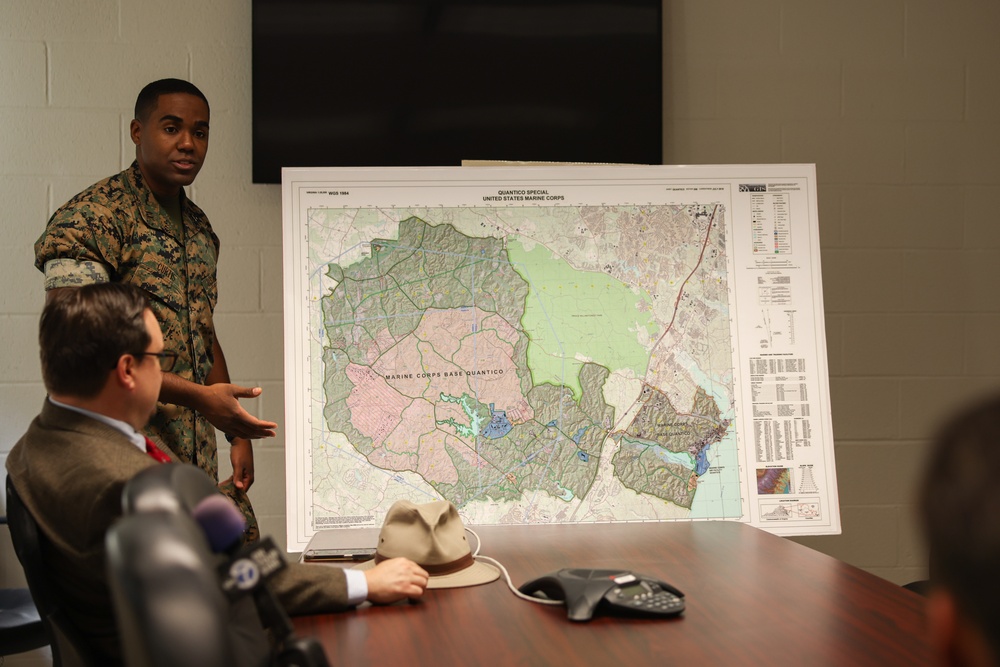 Col. Brooks welcomes visiting journalists for media roundtable discussion