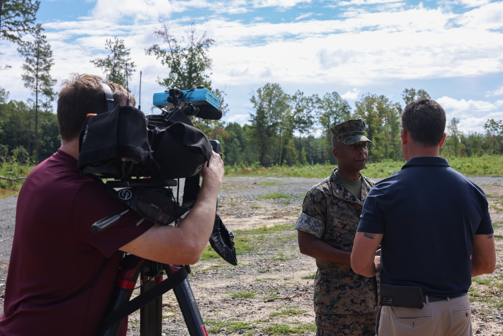 Col. Brooks welcomes visiting journalists for media roundtable discussion