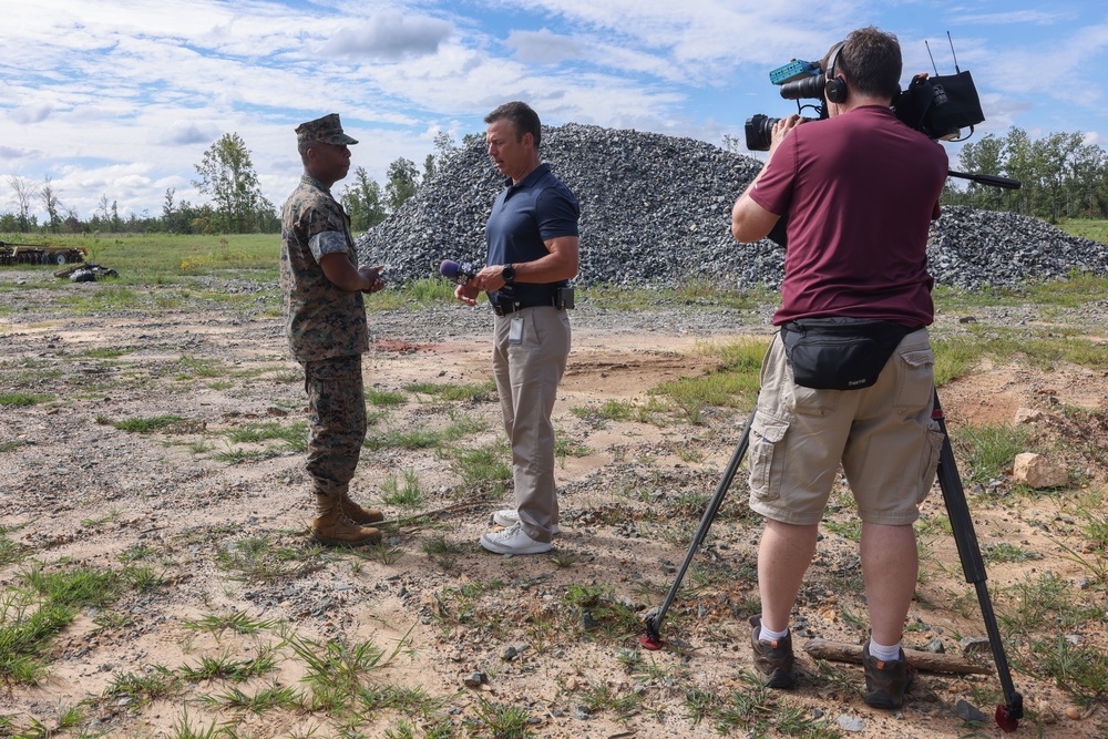 Col. Brooks welcomes visiting journalists for media roundtable discussion