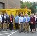 EXWC, DoD, and Teledyne personnel in front of Teledyne’s underwater fuel cell system