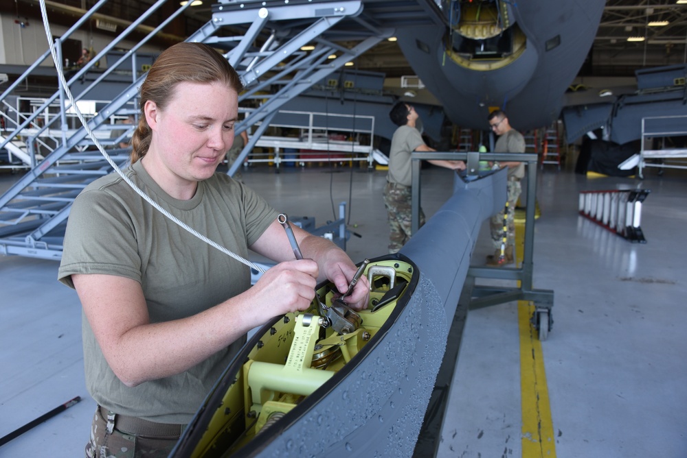 Britton installs KC-135 boom cable