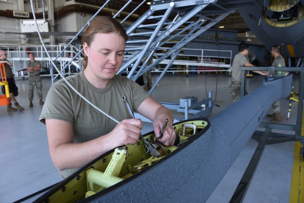 Britton installs boom cable on KC-135