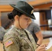 Staff Sgt. Melissa Jimenez oversees layout inprocessing for the 2023 U.S. Army Best Squad Competition