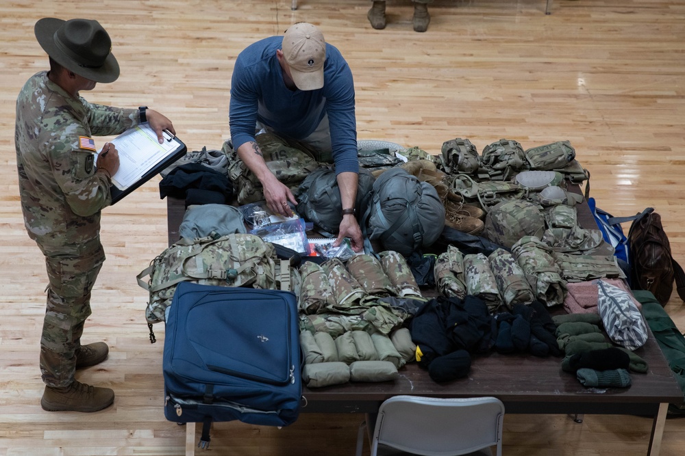 A U.S. Army Reserve Best Squad Competitor lays out gear