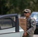 Florida State Guardsman operate point of distribution in Live Oak, FL