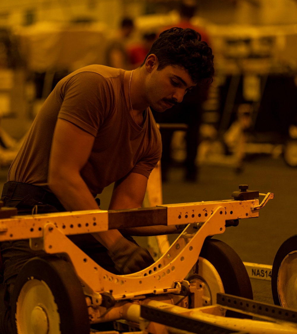 Sailors Disassembles Equipment