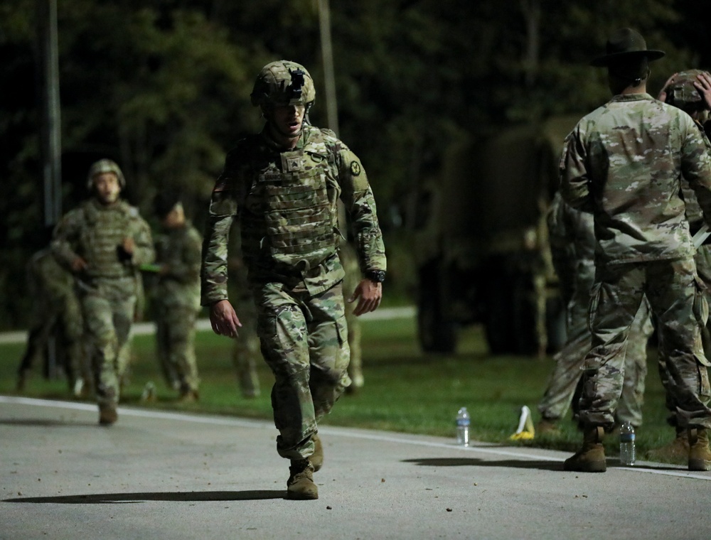 U.S. Army Reserve Best Squad Competitor perfoms the one mile run in full kit.