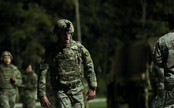 U.S. Army Reserve Best Squad Competitor perfoms the one mile run in full kit.