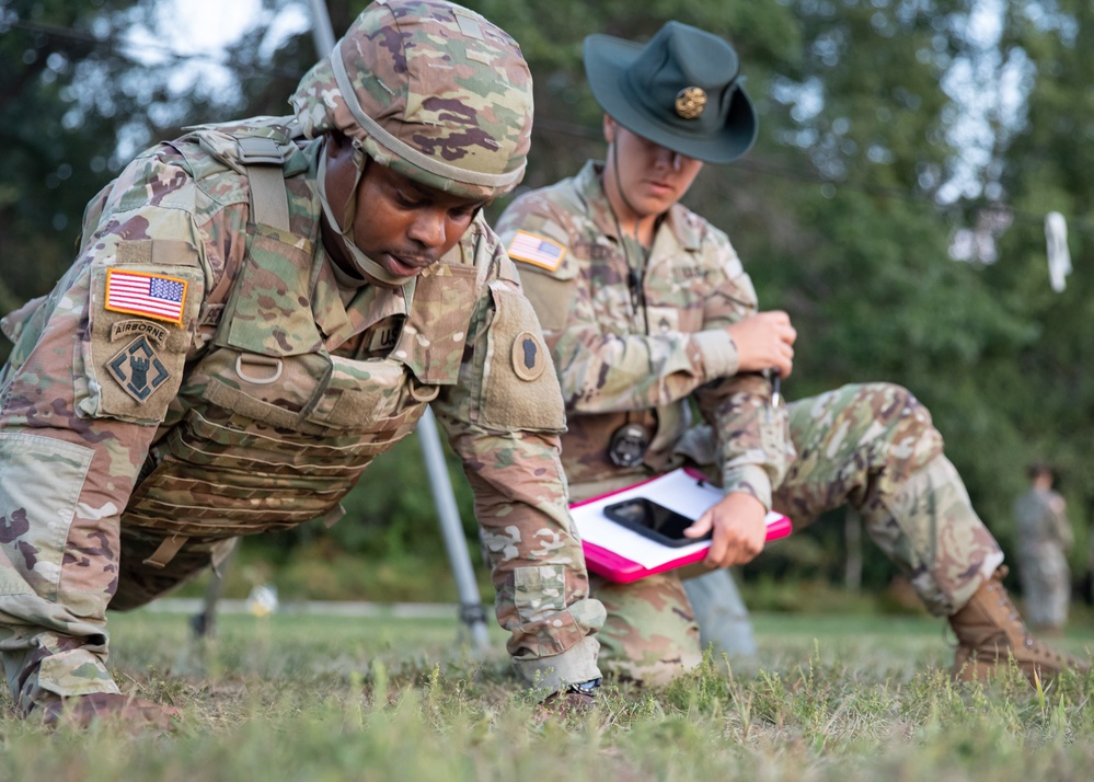 U.S. Army Reserve Staff Ssg. Homer Pennington performs push-ups during an Expert Physical Fitness Assessment