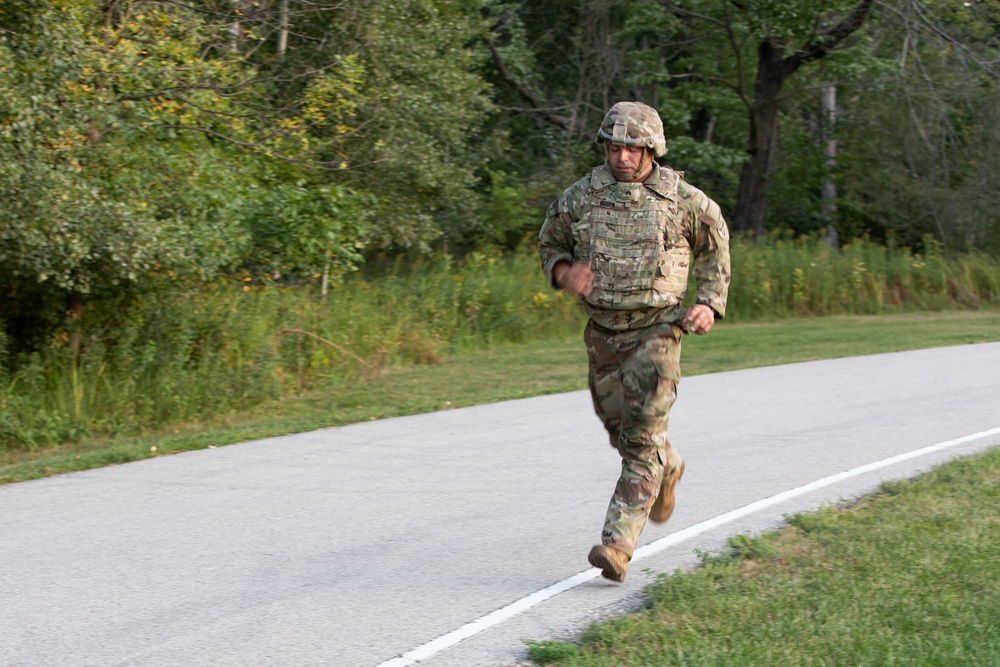 Army Reserve Sgt. Dalton completes a timed run during an Expert Physical Fitness Assessment