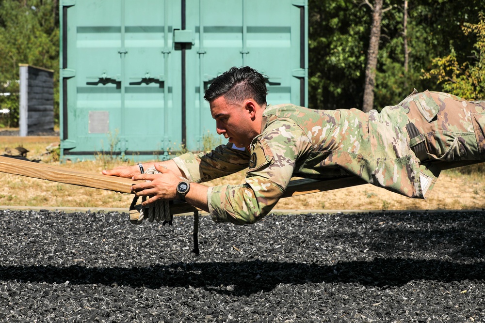 A U.S. Army Reserve Best Squad competitor participates in the Squad Leader Reaction Course