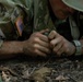 Cpl. Michael Glosemeyer prepares a practice grenade