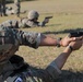 Spc. Stephan Mixter shoots an M17 in the prone position