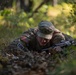 Sgt. James Ranstead low crawls through a trench