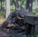 Sgt. James Ranstead simulates the steps a soldier takes prior to throwing a hand grenade.