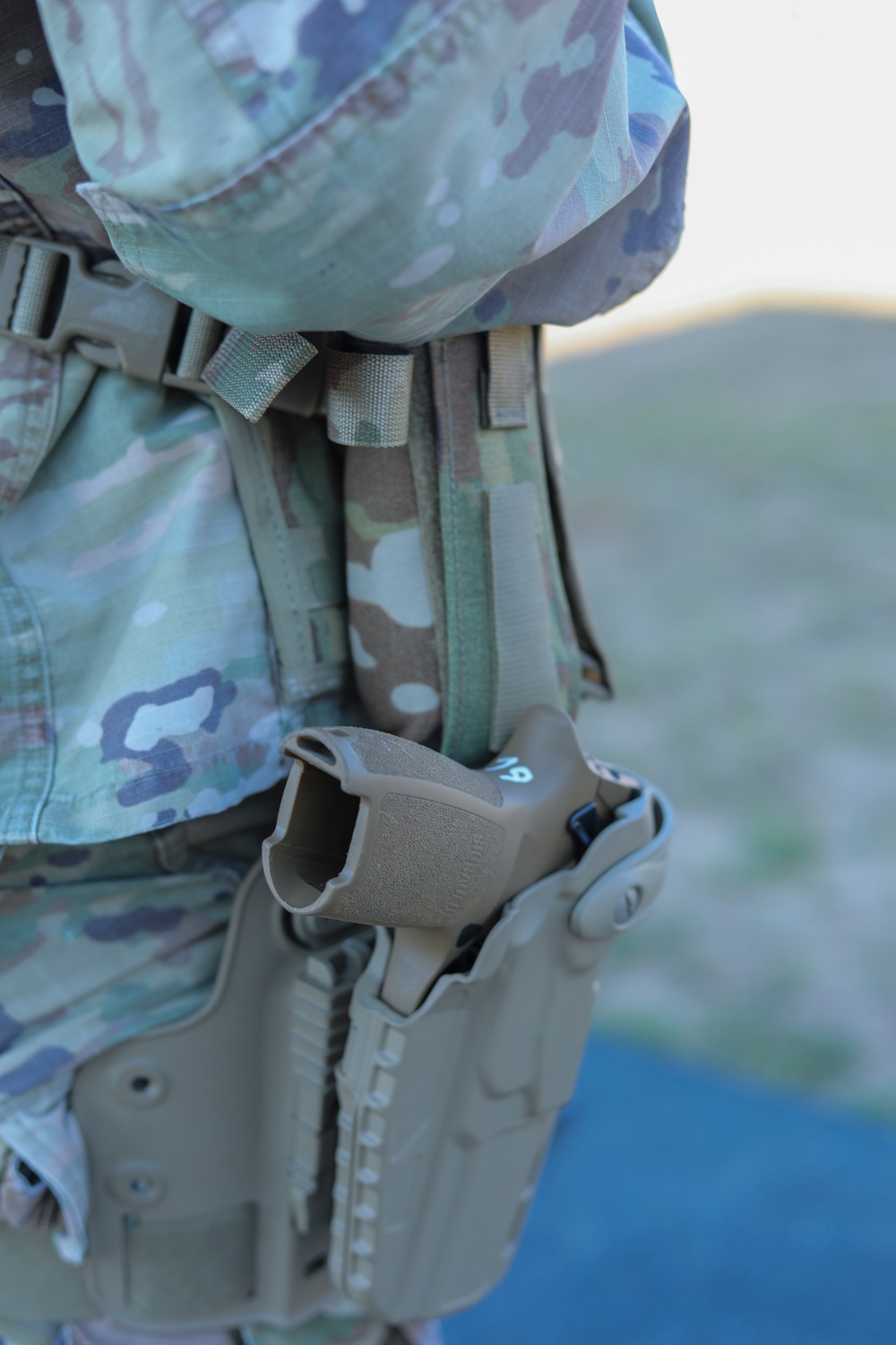 U.S. Army Reserve Best Squad Competitor waits at the M17 pistol Excellence in Competition event