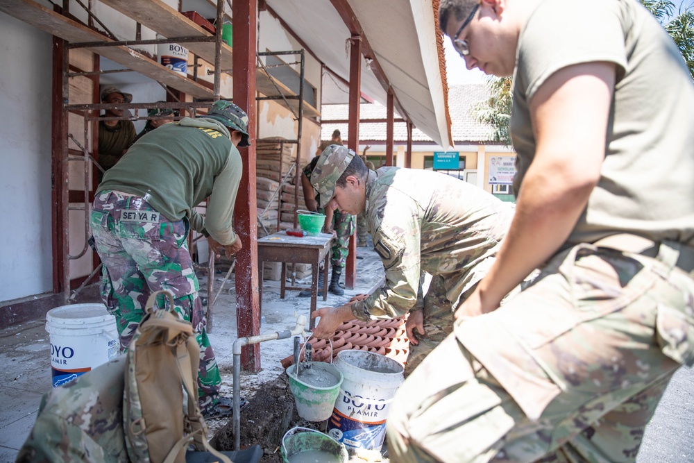 770th Engineers and TNI build a School and Library