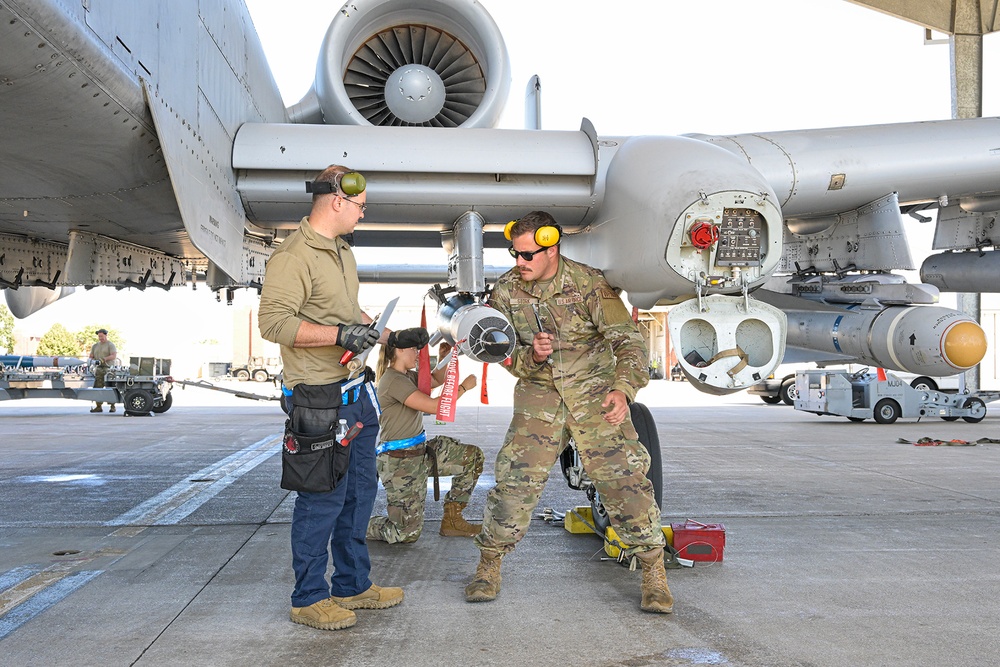 Load crew from 127th AMXS uploading a GBU-12 Paveway II