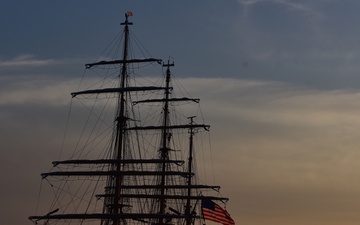 Returning from four-month training deployment in Europe, Coast Guard Cutter Eagle anchors in New York Harbor