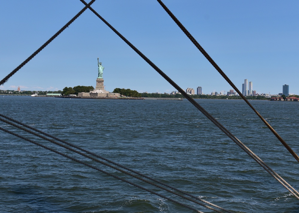 Coast Guard Cutter Eagle bids farewell to Statue of Liberty, New York City during training cruise