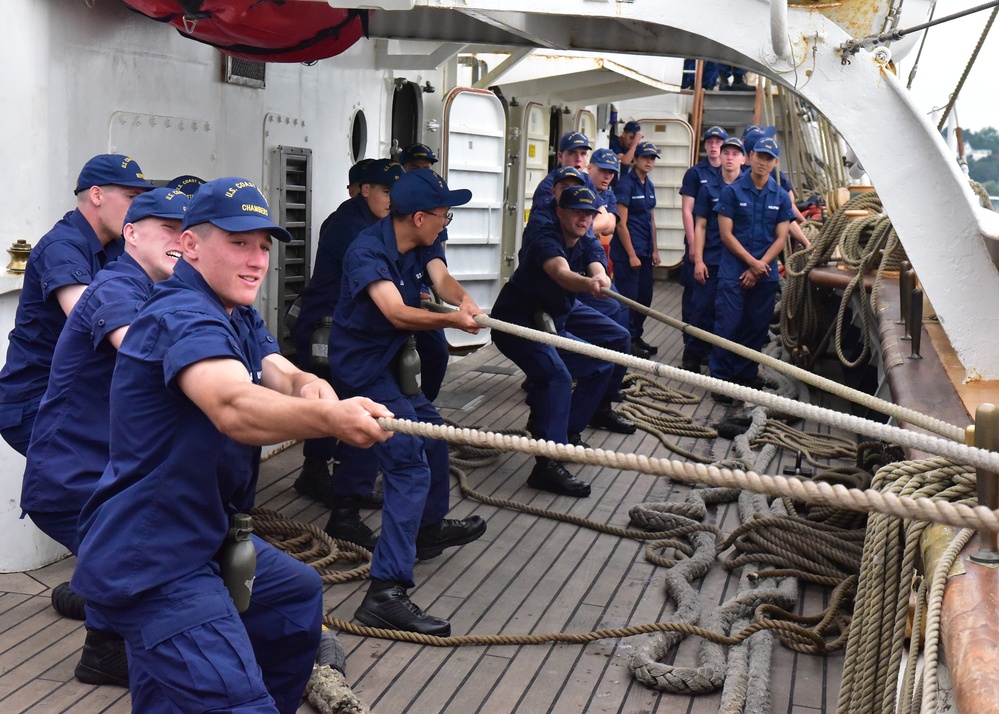 Swabs from Coast Guard Academy Class of 2027 use teamwork, muscle power aboard Coast Guard Cutter Eagle