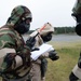 102nd Intelligence Wing Airmen participate in CBRNE training during deployment exercise