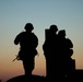 U.S. Army Reserve Best Squad Competitors wait to shoot during the night qualification