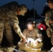 Sgt. Emily Green receives instruction on assembling a Night Observation Device