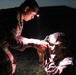 Sgt. Danny Marrerocaballero receives instruction on assembling a Night Observation Device