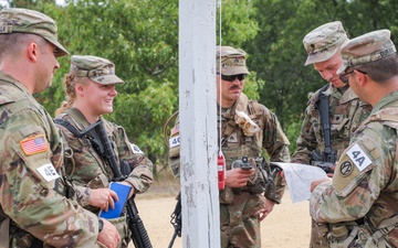 From Track to Troop: The Tale of Spc. Kynzi Booth and the &quot;Goofball&quot; Squad