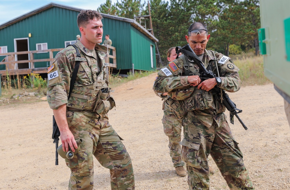 U.S. Army Reserve Best Squad competitors refill their canteens