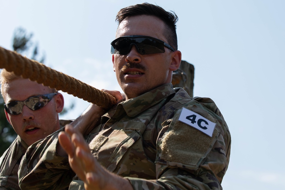 Spc. Trenton Rumba directs his squad members