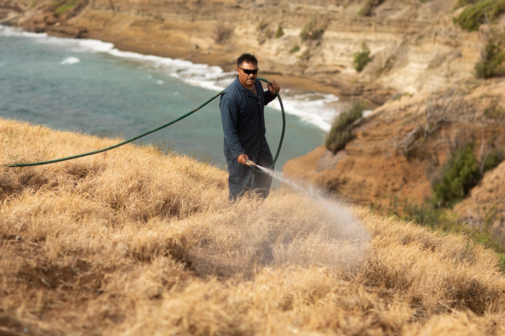 Cease Fire!: MCBH Range Maintenance Personnel spray fire retardant at Crater Range