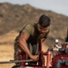 Cease Fire!: MCBH Range Maintenance Personnel spray fire retardant at Crater Range