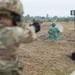 Army Spc. Carlin Houston fires the M17 pistol