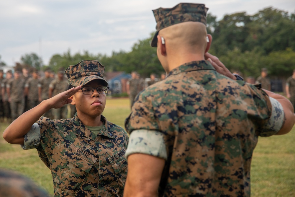 MARFORRES Headquarters Battalion Commanding Officer awards the NCO of the Quarter