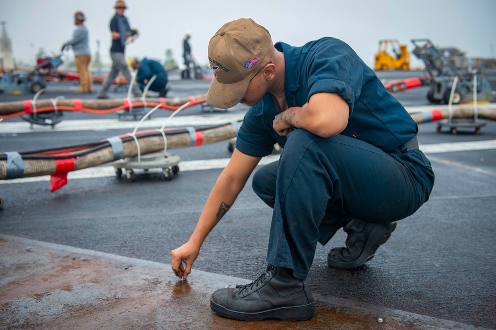 Sailor Performs Maintenance Aboard USS Carl Vinson (CVN 70)