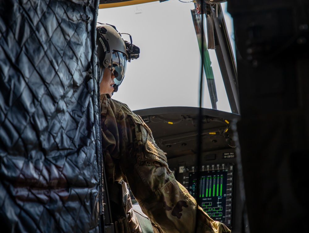 U.S. Army Pilot prepares to take off on a CH-47F Chinook