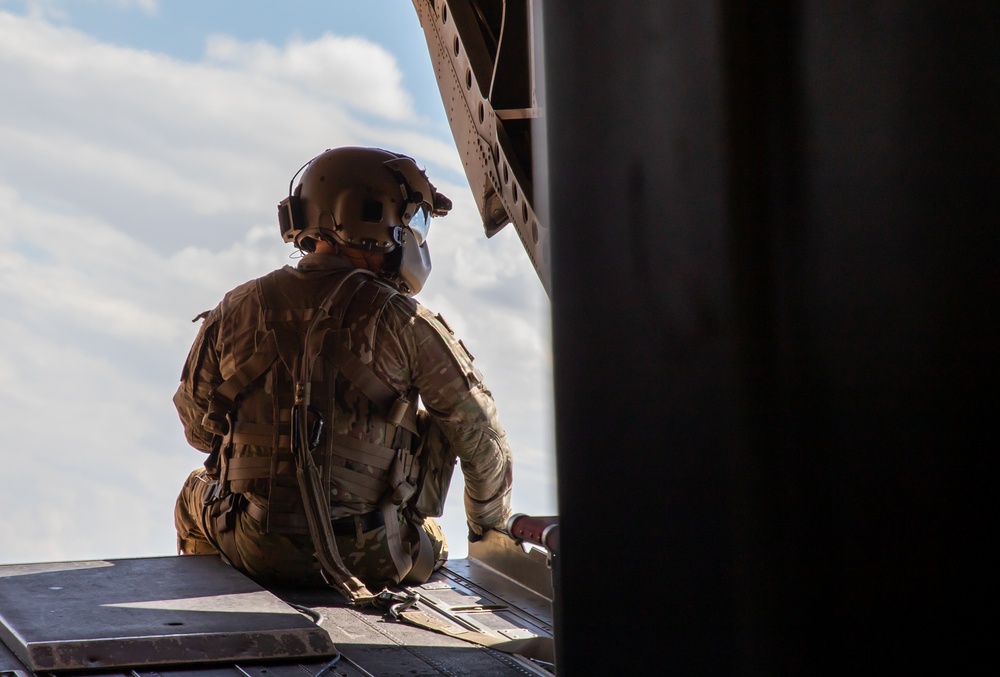 U.S. Army Crew Chief scans the horizon