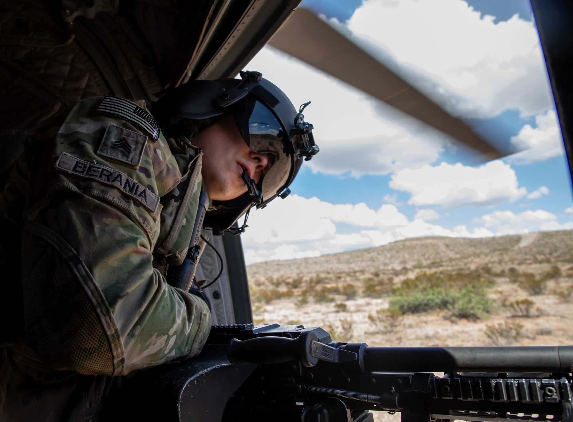 DVIDS - Images - U.S. Army Door Gunner scans terrain for landing