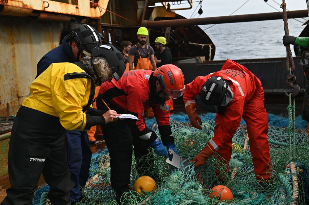 U.S. Coast Guard Cutter Forward crew members participate in Northwest Atlantic Fisheries Organization-led inspection at sea in the Atlantic Ocean