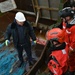 U.S. Coast Guard Cutter Forward crew members participate in Northwest Atlantic Fisheries Organization-led inspection at sea in the Atlantic Ocean