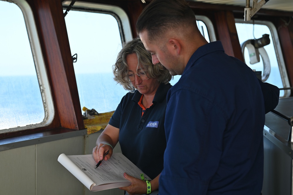 U.S. Coast Guard Cutter Forward crew members participate in Northwest Atlantic Fisheries Organization-led inspection at sea in the Atlantic Ocean