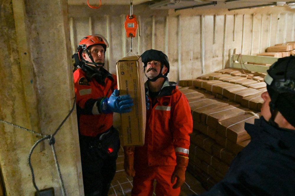U.S. Coast Guard Cutter Forward crew members participate in Northwest Atlantic Fisheries Organization-led inspection at sea in the Atlantic Ocean
