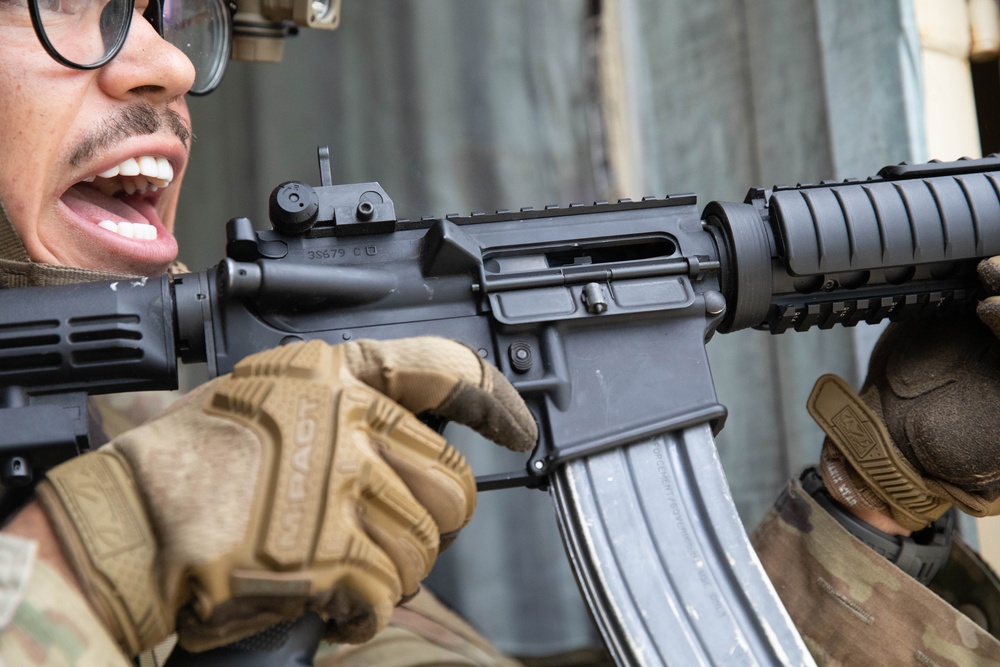 Spc. Nelson Medina communicates with his team